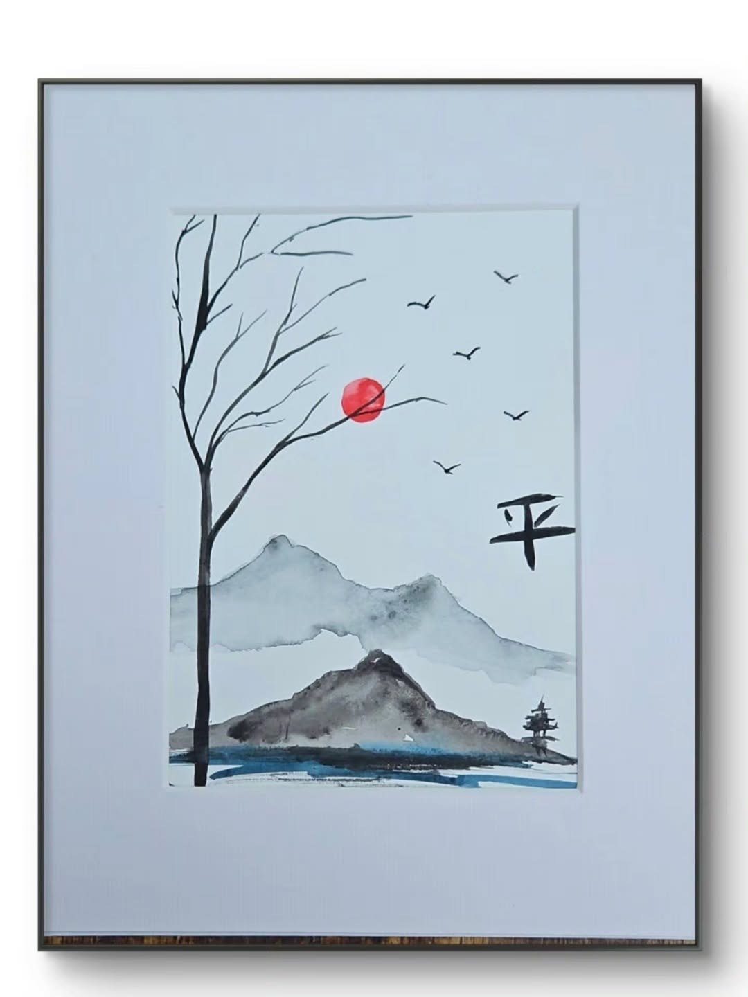 Ink painting of a mountain landscape with a red sun